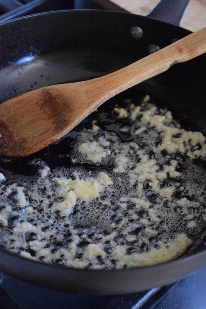 Cooking garlic in butter.