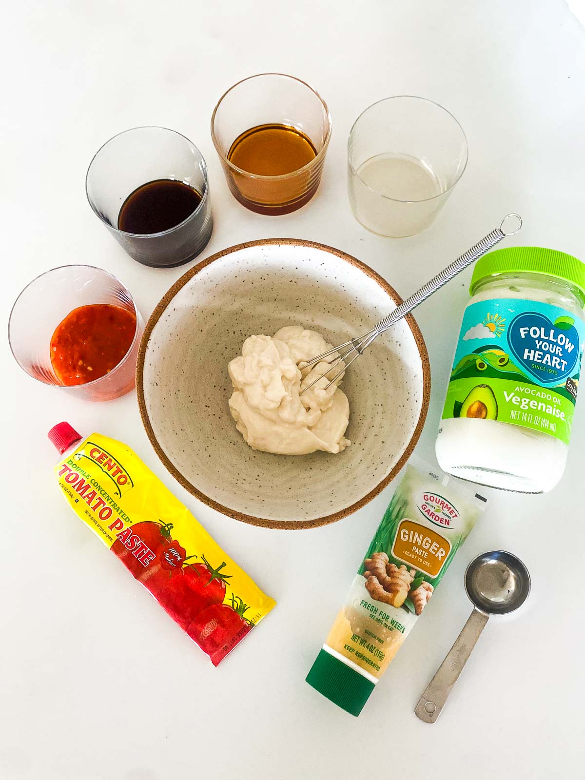 Ingredients for Yum Yum Sauce gathered around a bowl