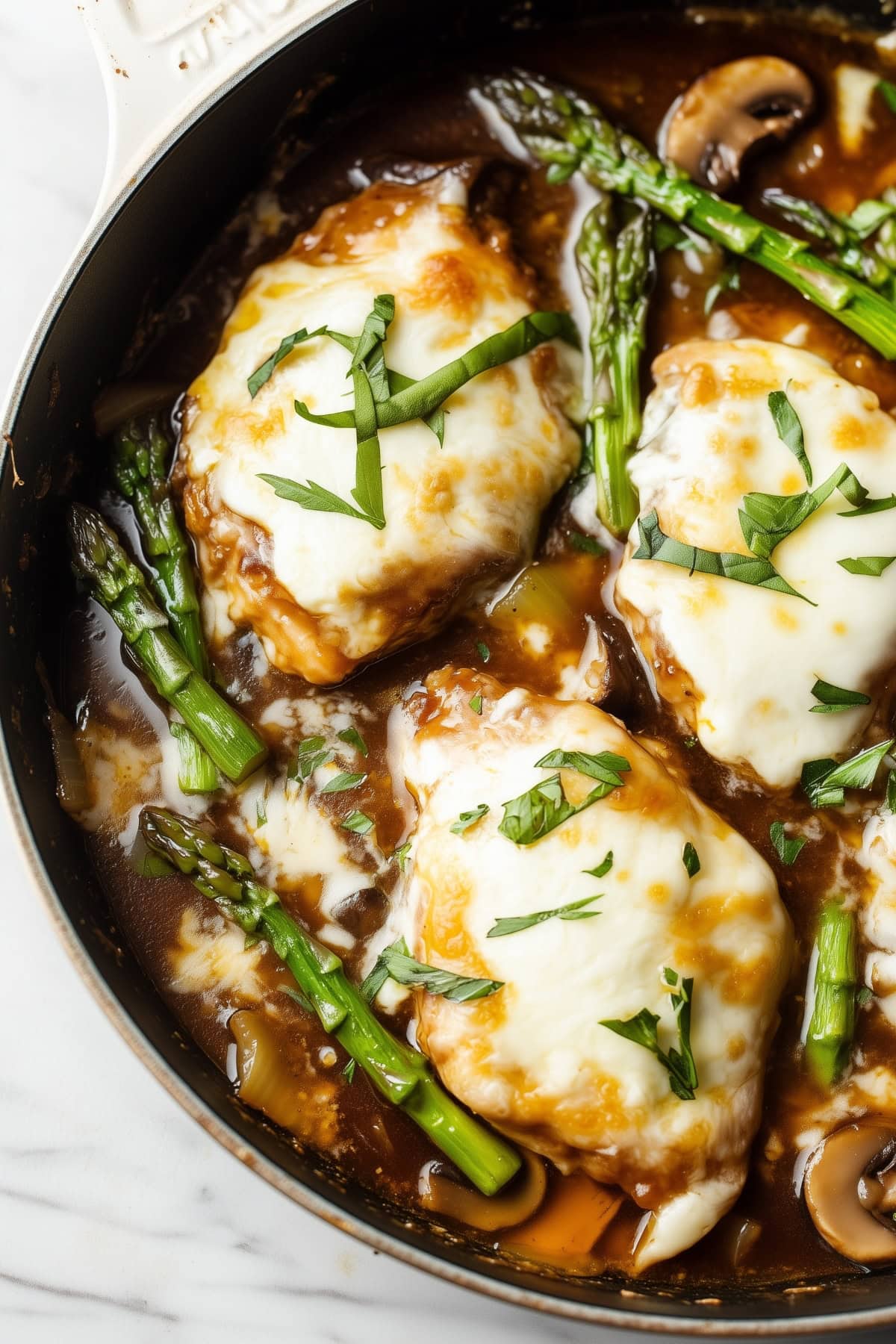 An overhead view of a delicious Chicken Madeira dish.
