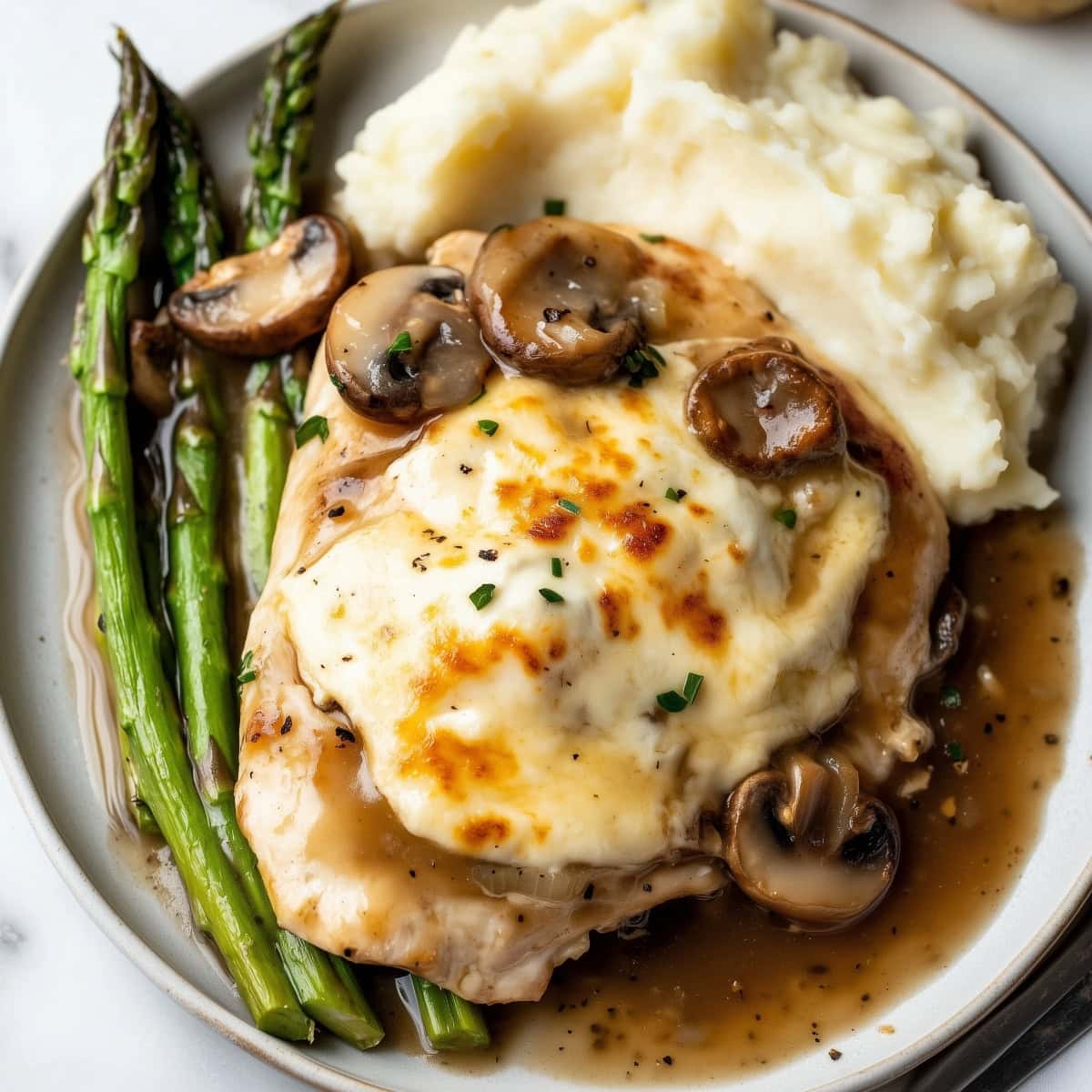 A plated Chicken Madeira showcasing its beautiful presentation.