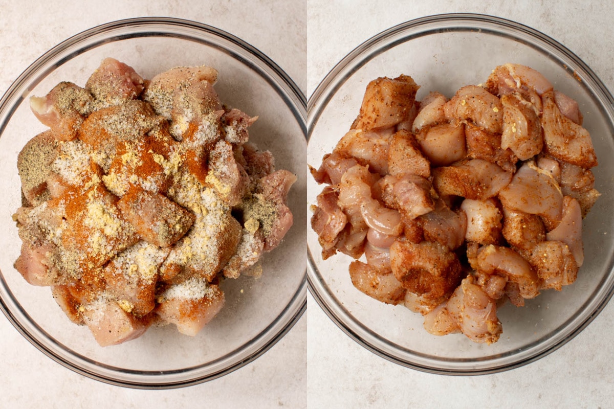 Cut-up chicken pieces in a bowl with all of the seasonings on top.
