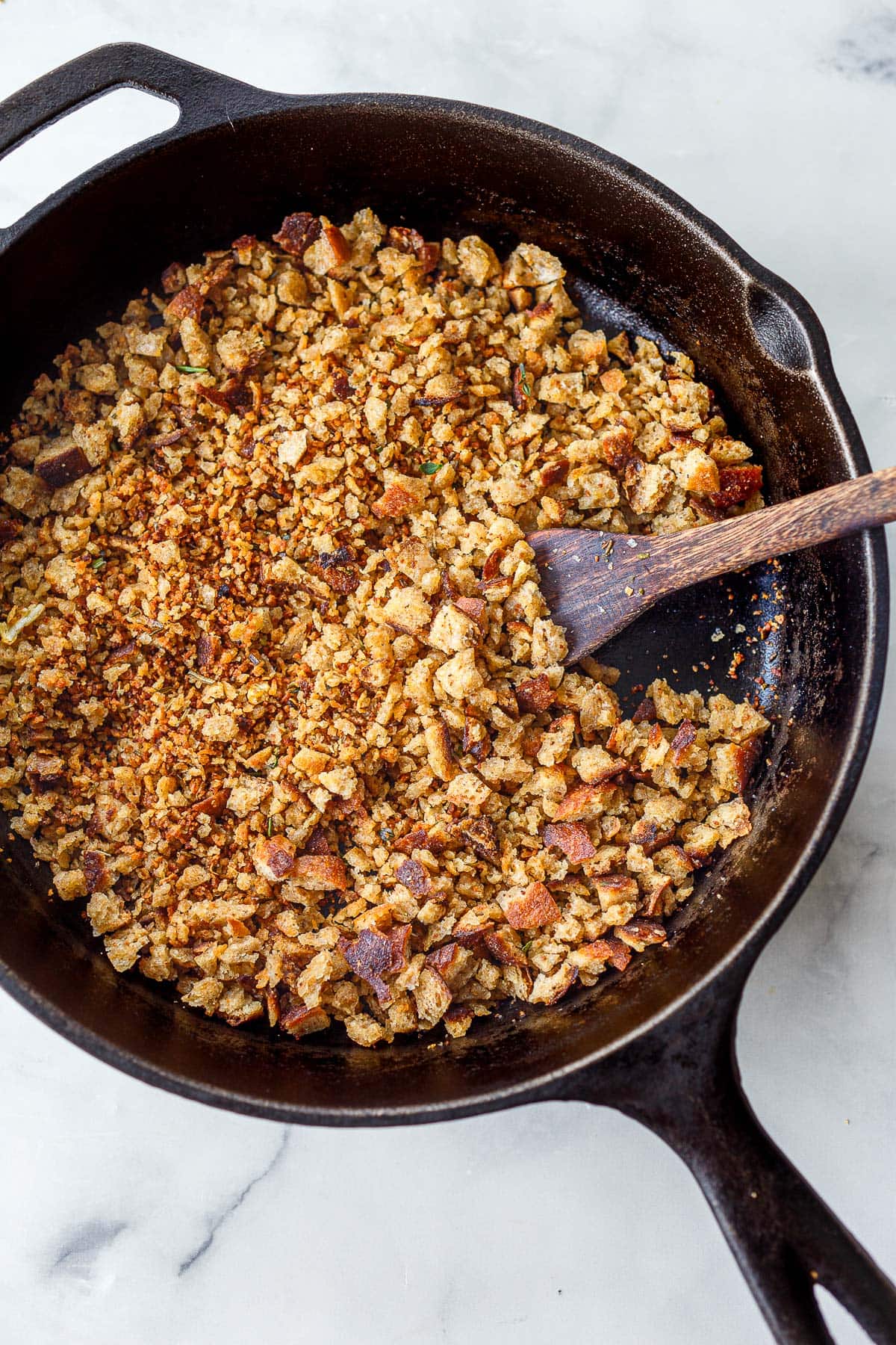 Toasted pangrattato in a cast iron skillet