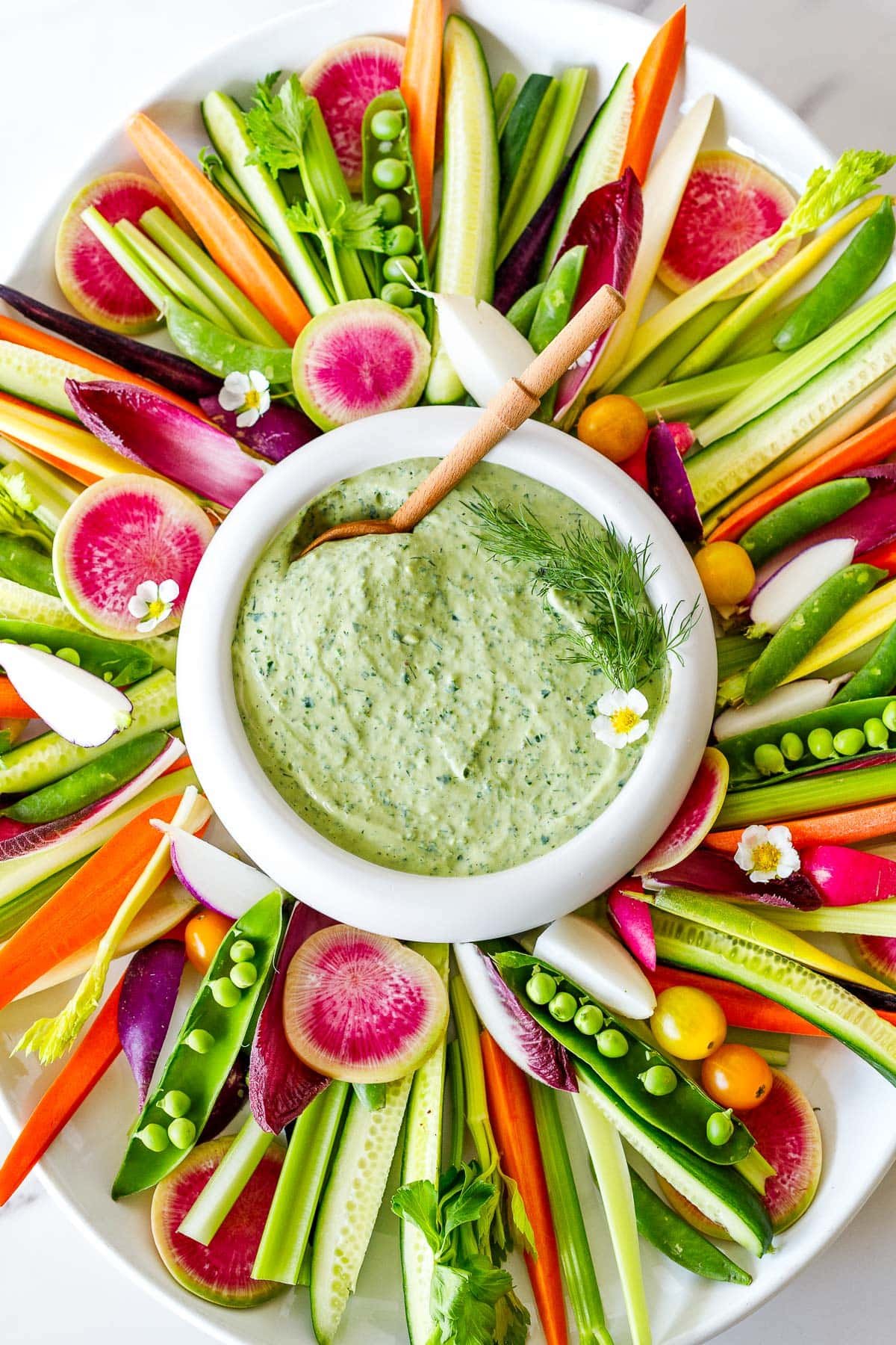 Colorful crudités with green goddess dressing