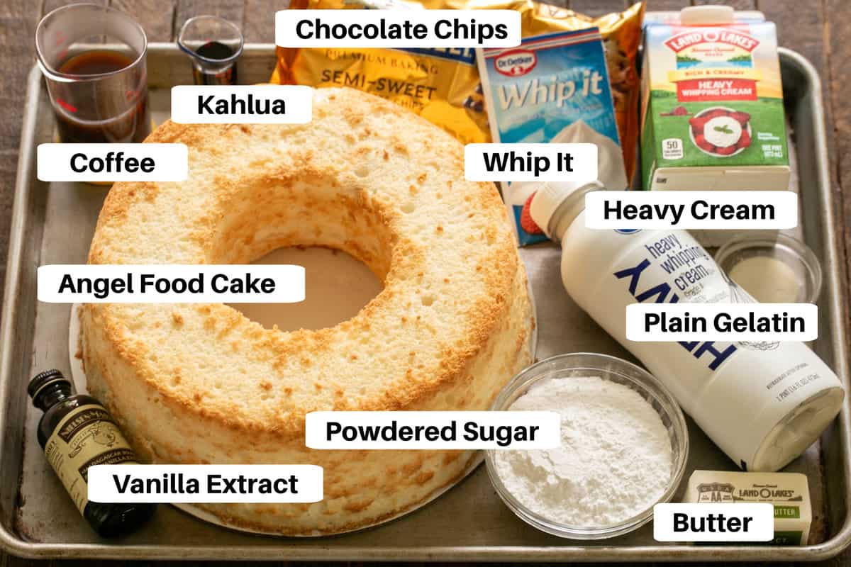 Ingredients for mousse-filled angel food cake with labels on a sheet pan