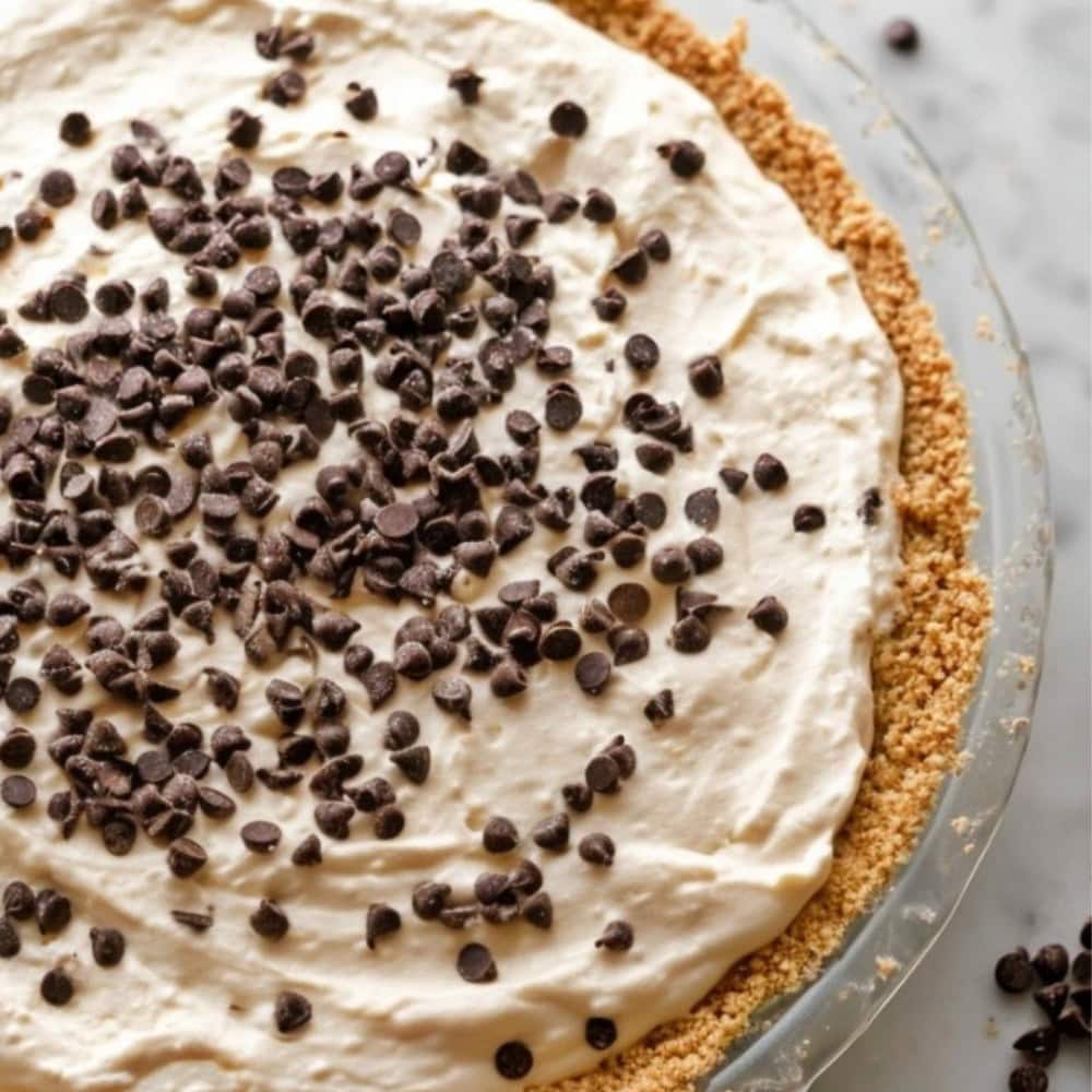 Cannoli pie topped with chocolate chips.