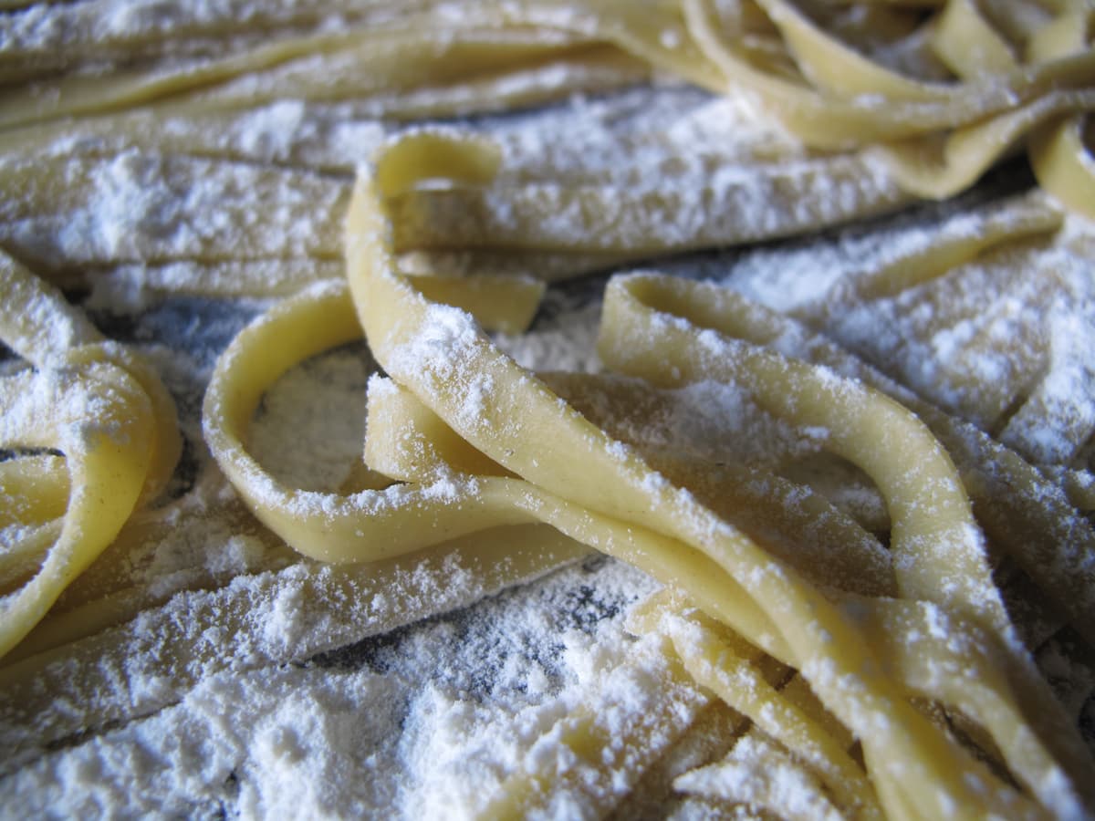 Close-up of pasta noodles dusted with flour