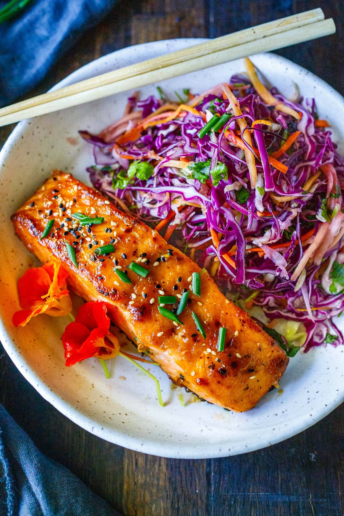Broiled salmon served with Asian slaw.