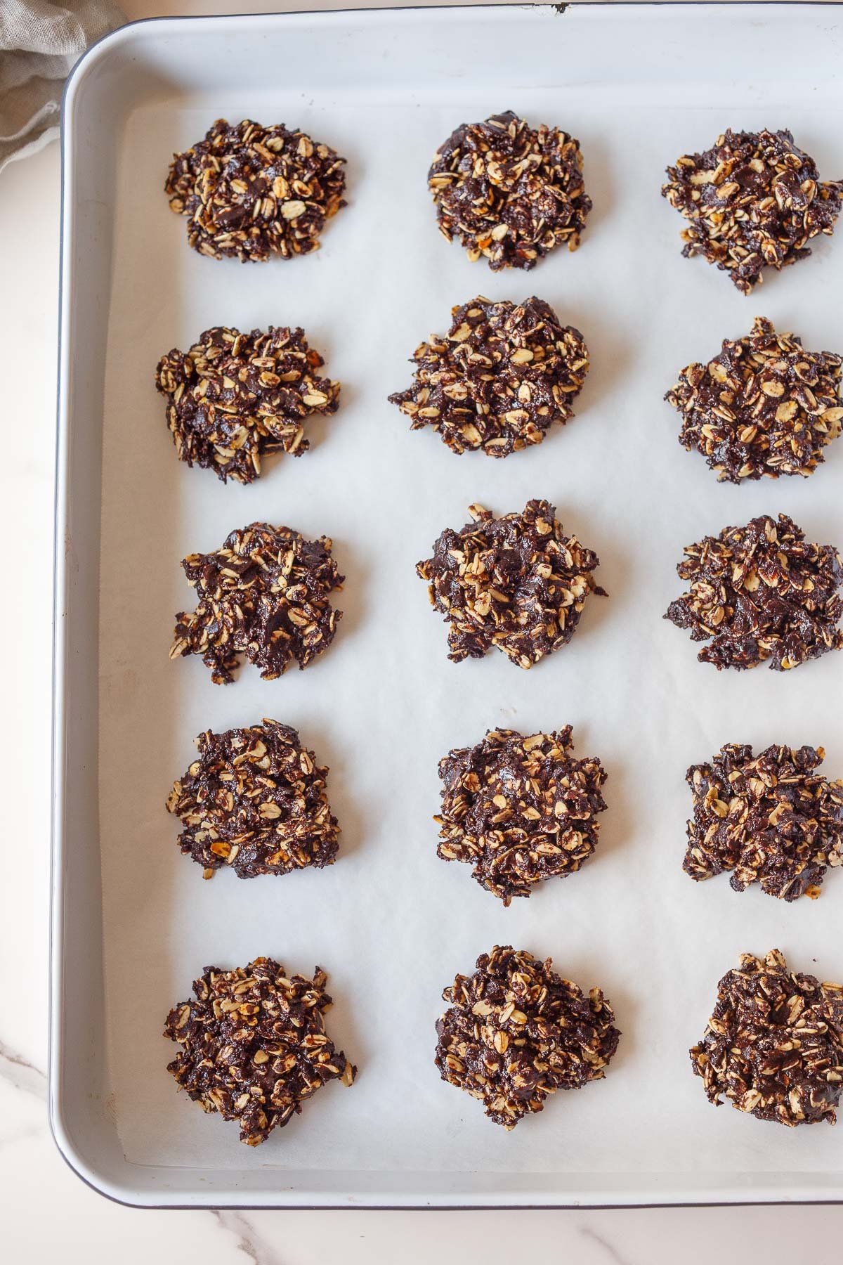 Shaped no-bake cookies on baking sheet