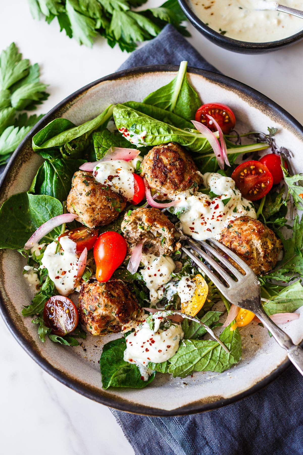 Turkey and Zucchini Meatballs with feta yogurt sauce
