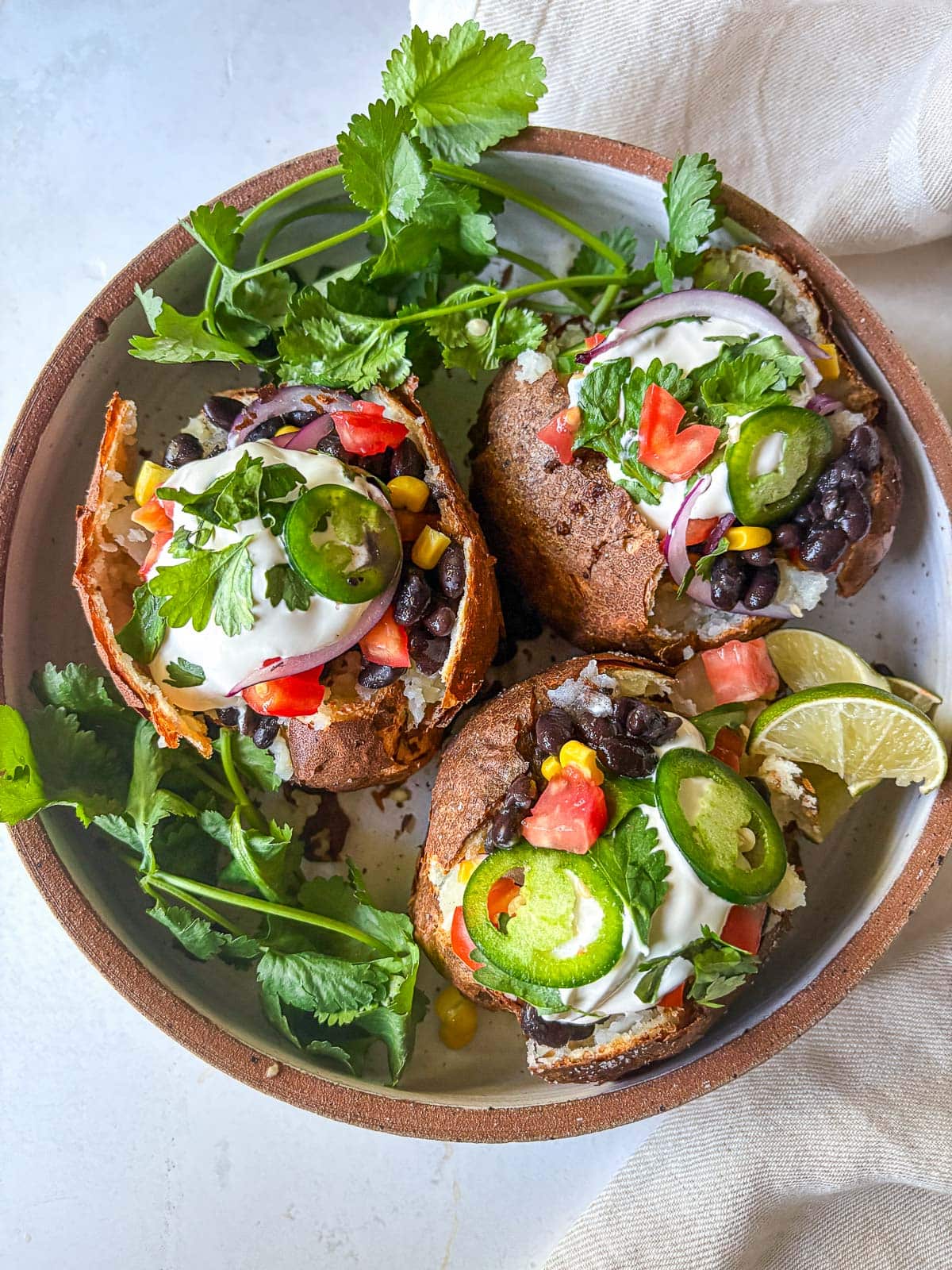 Mexican Baked Potatoes topped and ready to serve