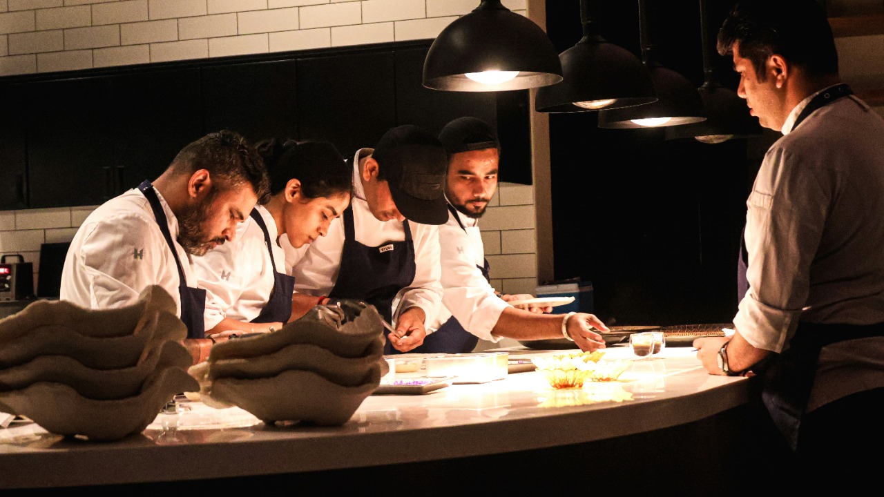Group of chefs tasting together